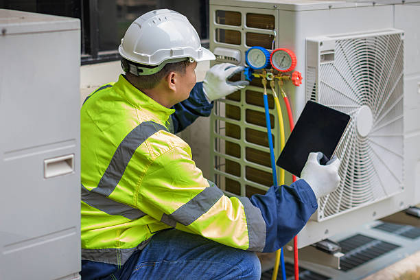Professional Hvac Maintenance technician working in Ames, TX